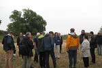 Field tour group on Elbe river beach