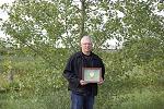 Bill Schroeder with award