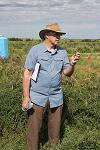 Bill Schroeder in alfalfa field