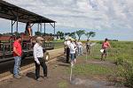 Field tour group with transport